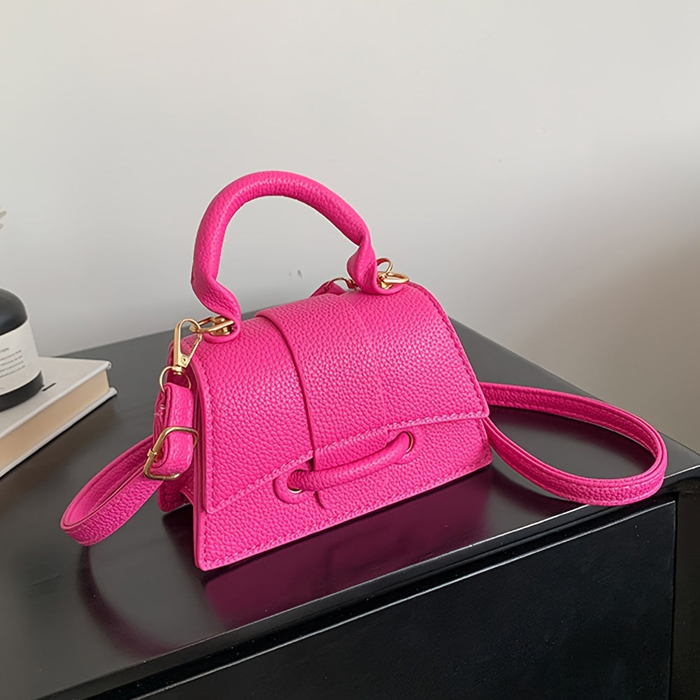 Zamonaviy niş dizayni, yuqori tutqichi va kvadrat shakli bilan uslubiy mini crossbody sumka.