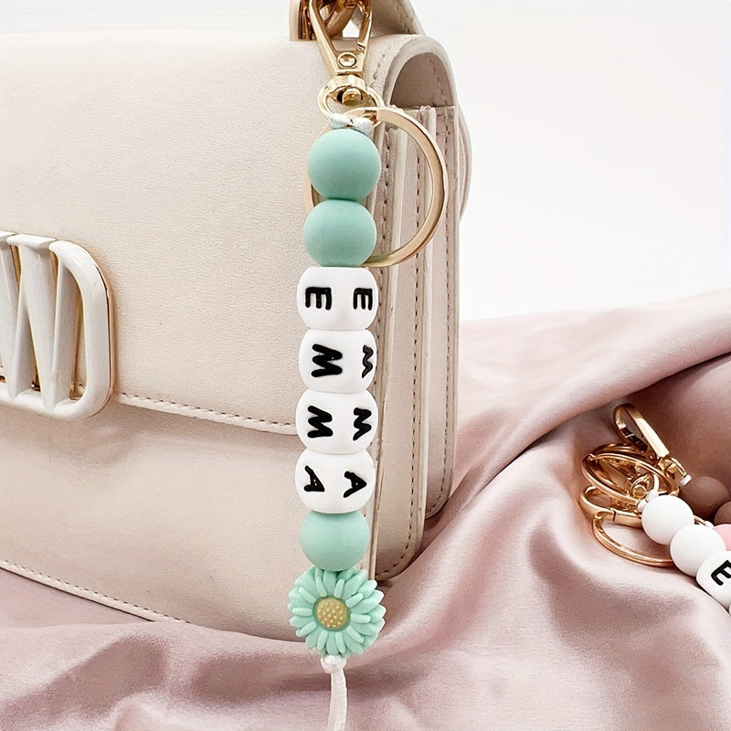 Llavero personalizado con nombre, cuenta de silicona con margarita y letras para mochilas y regalos