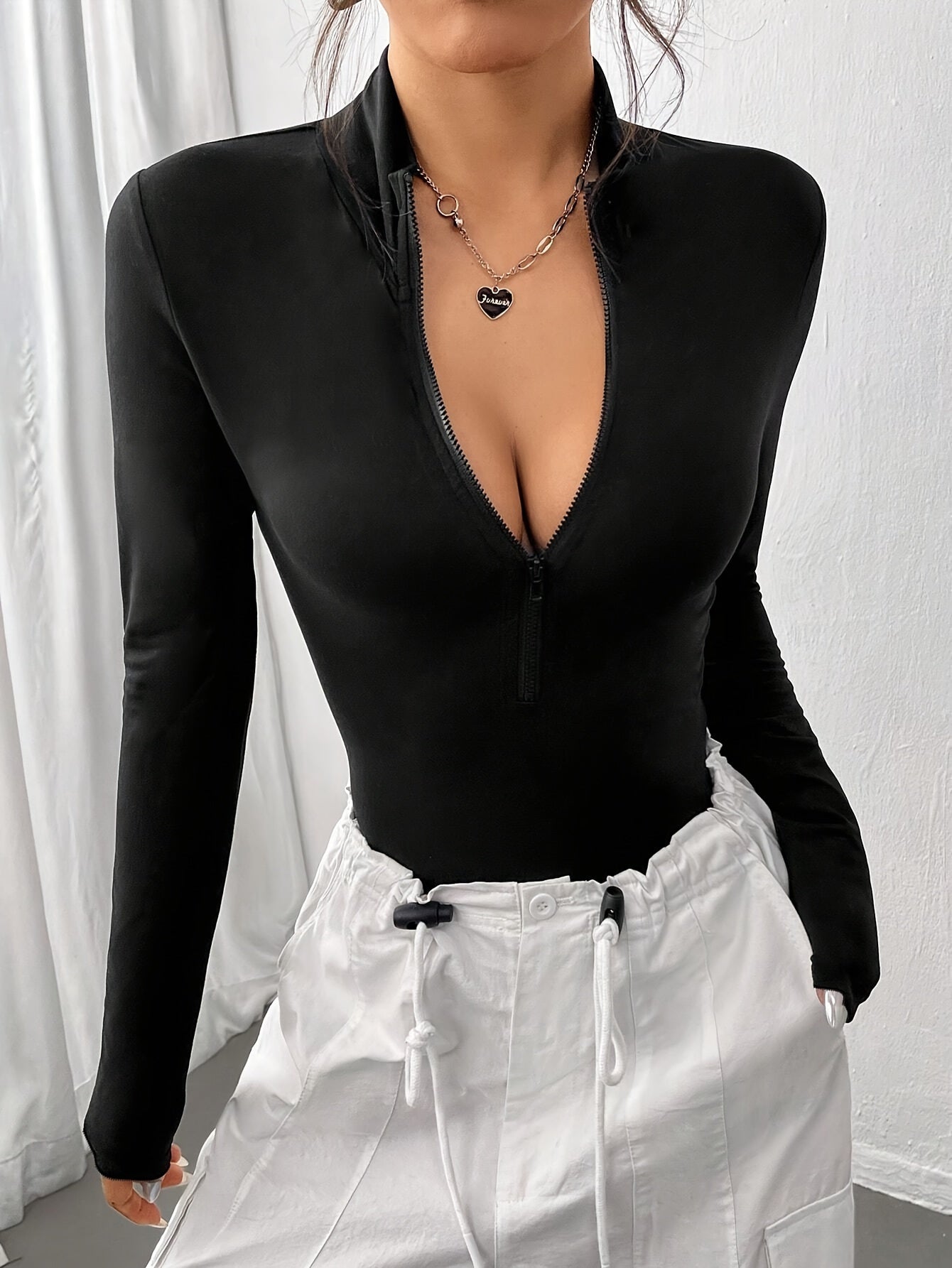 Women's Black Y2K Style Zip-Up Bodysuit with Long Sleeves and Stretchy Fabric