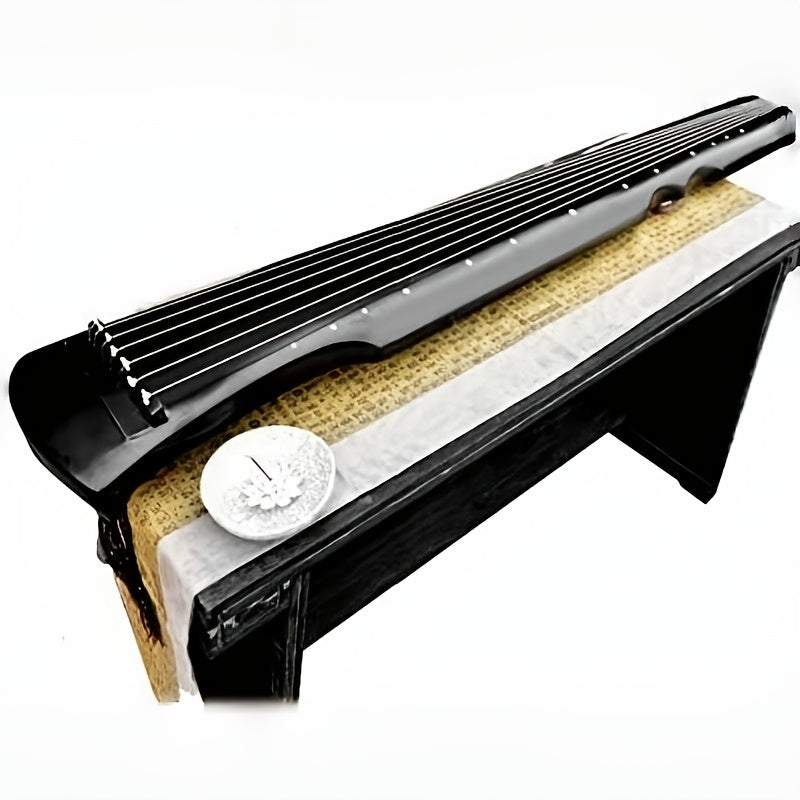 Guqin tradicional chino hecho de madera sólida de paulownia con acabado negro y clavijas de afinación doradas para principiantes