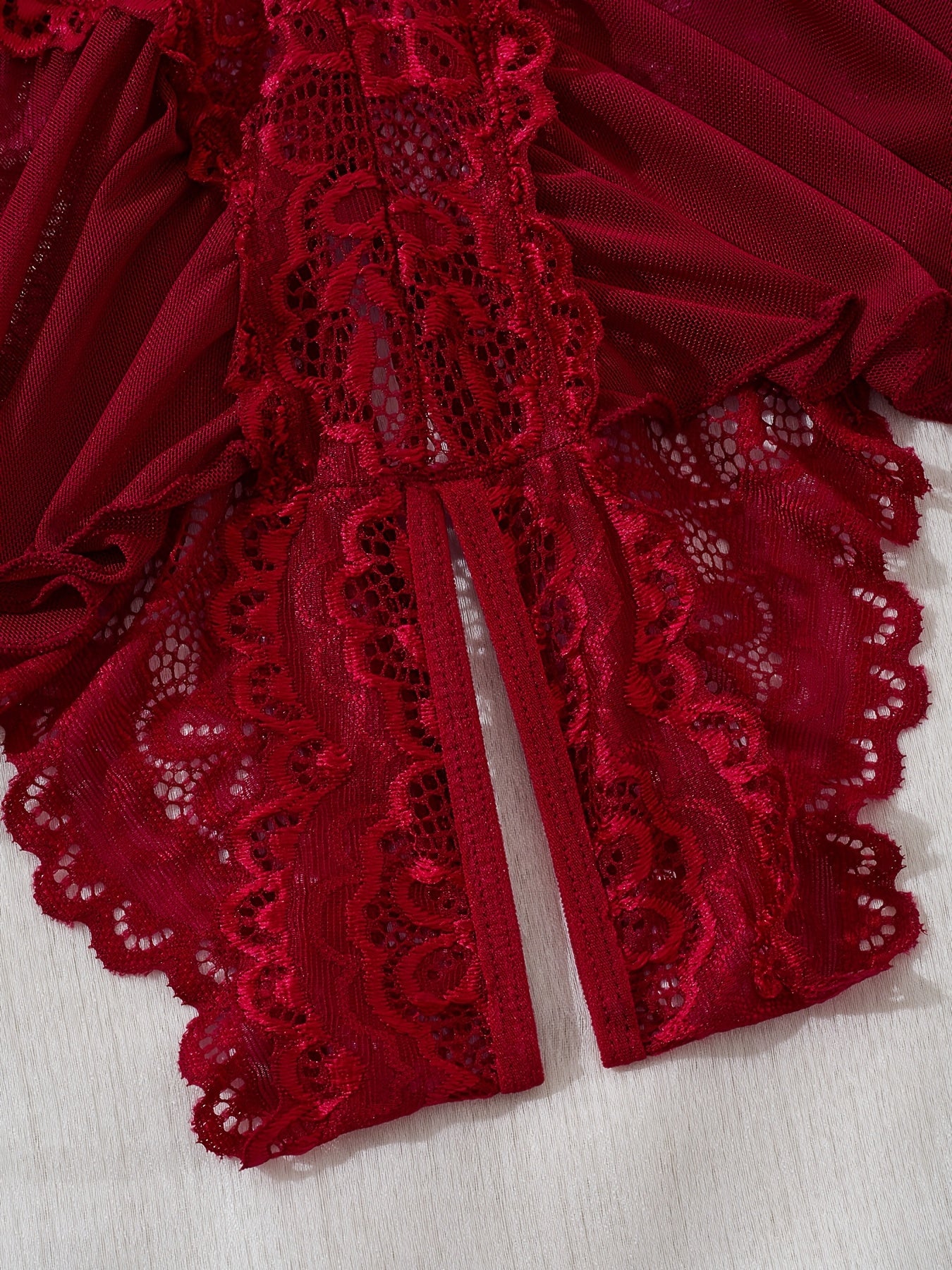 Plus Size Red Lace Lingerie Bodysuit with Sheer Mesh and Backless Halter Design