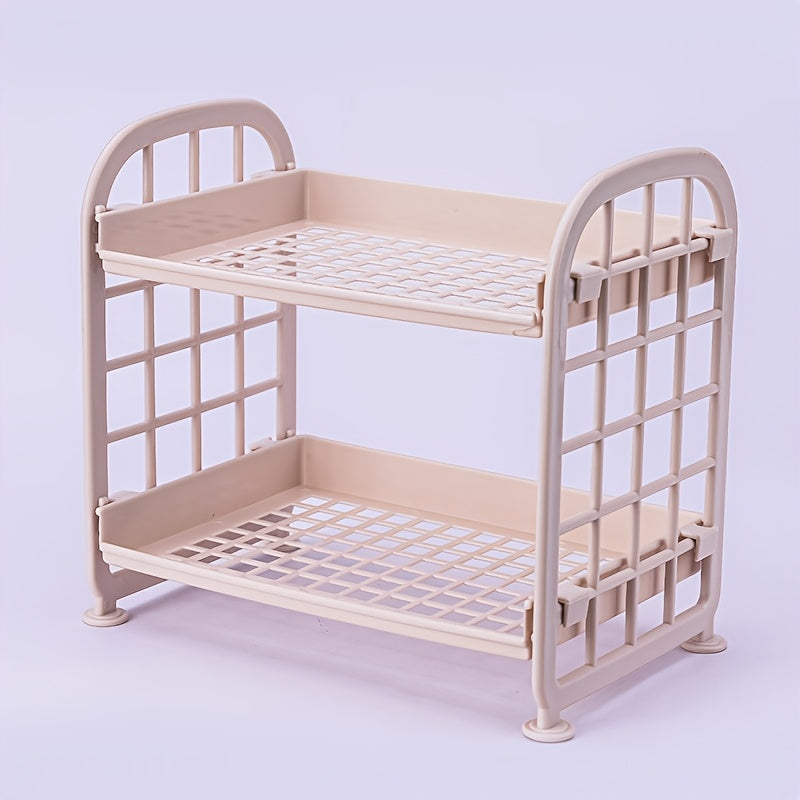 Plastikdan yasalgan kichik 2-qavatli saqlash tashkilotchisi, oshxona, yotoqxona, yashash xonasi, stol va hammom shkafi uchun mos. Ochiq saqlash dizayni, yig'ish talab etiladi, elektr energiyasi talab qilinmaydi.