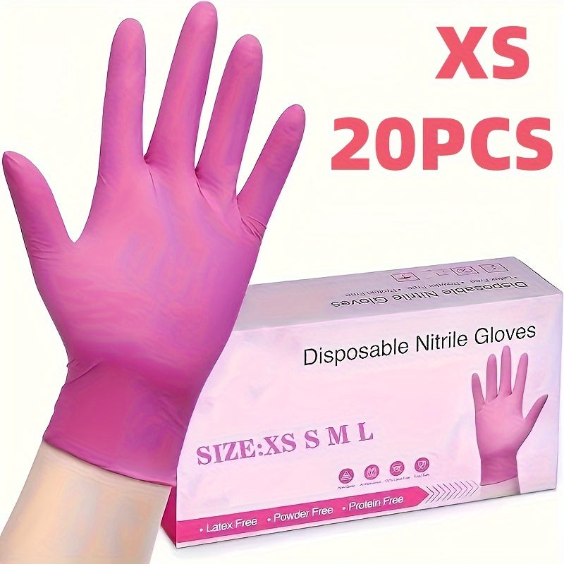 Одноразовые перчатки светло-розового цвета для уборки.