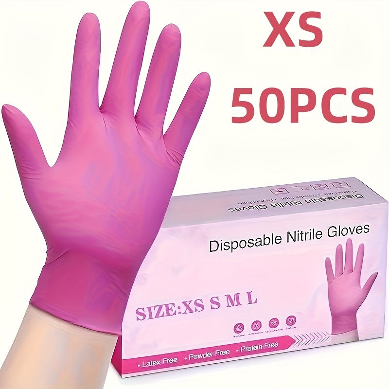 Одноразовые перчатки светло-розового цвета для уборки.