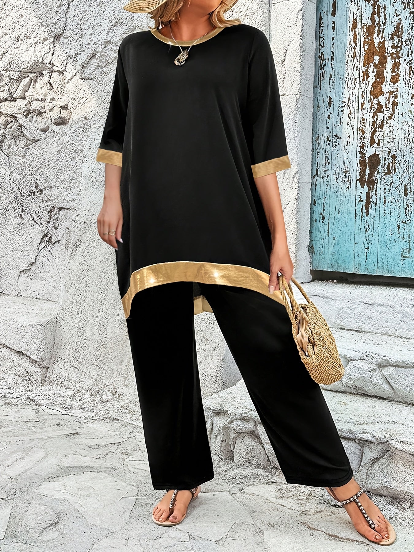 Asimmetrik hemli yuqori va bir rangli shimlar katta o'lchamdagi ikki qismli to'plam.