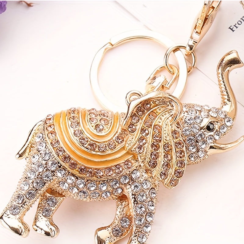 Мультяшный брелок-слон с стразами - очаровательный брелок для сумки, ручной сумки или автомобиля. Включает аксессуар для наушников. Идеальный подарок на День матери.