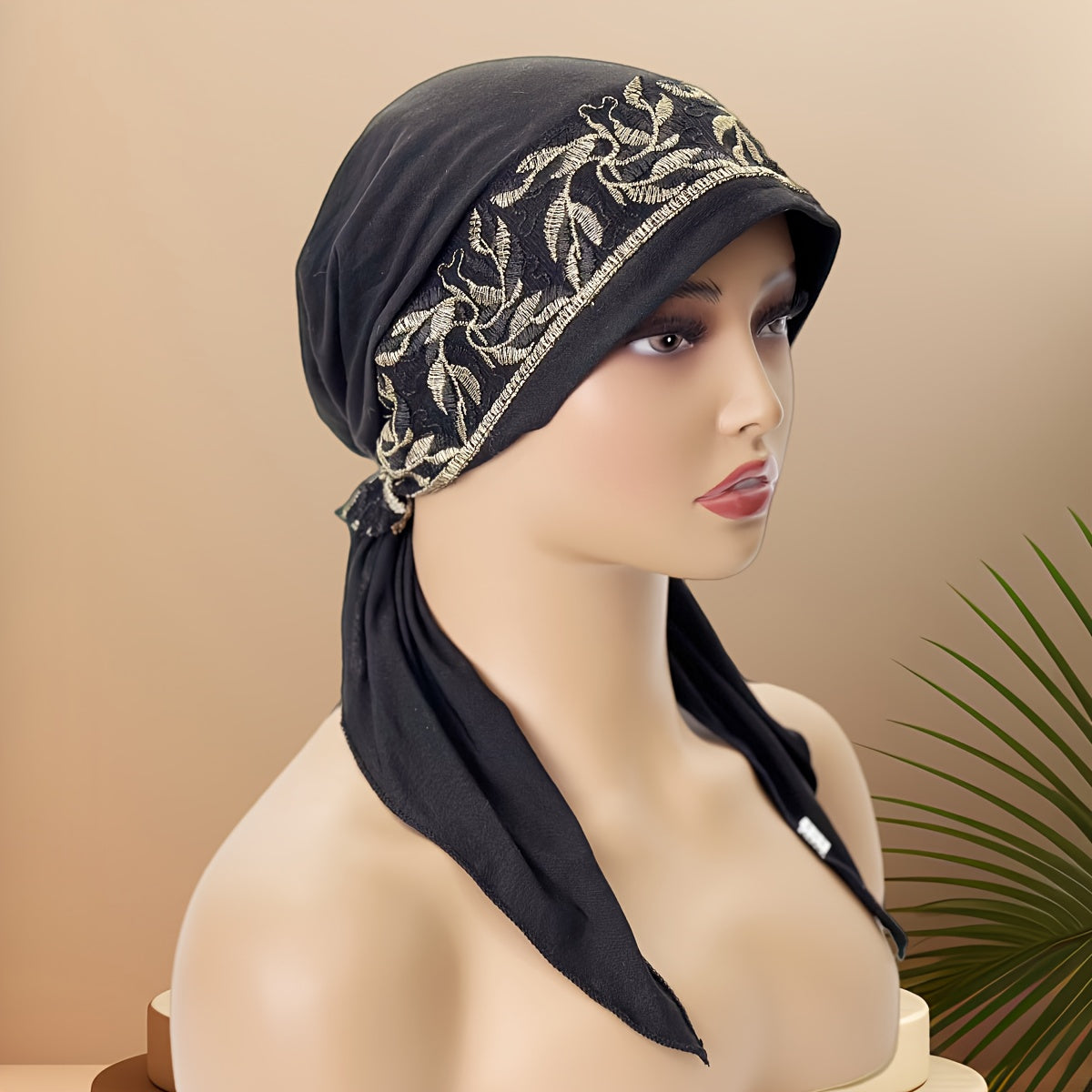 Black Elastic Chemo Hat with Embroidered Turban Design and Tails