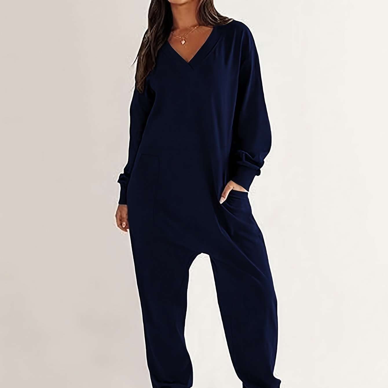 Mono sin mangas de talla grande para mujer con escote en V profundo y hombros caídos, color negro