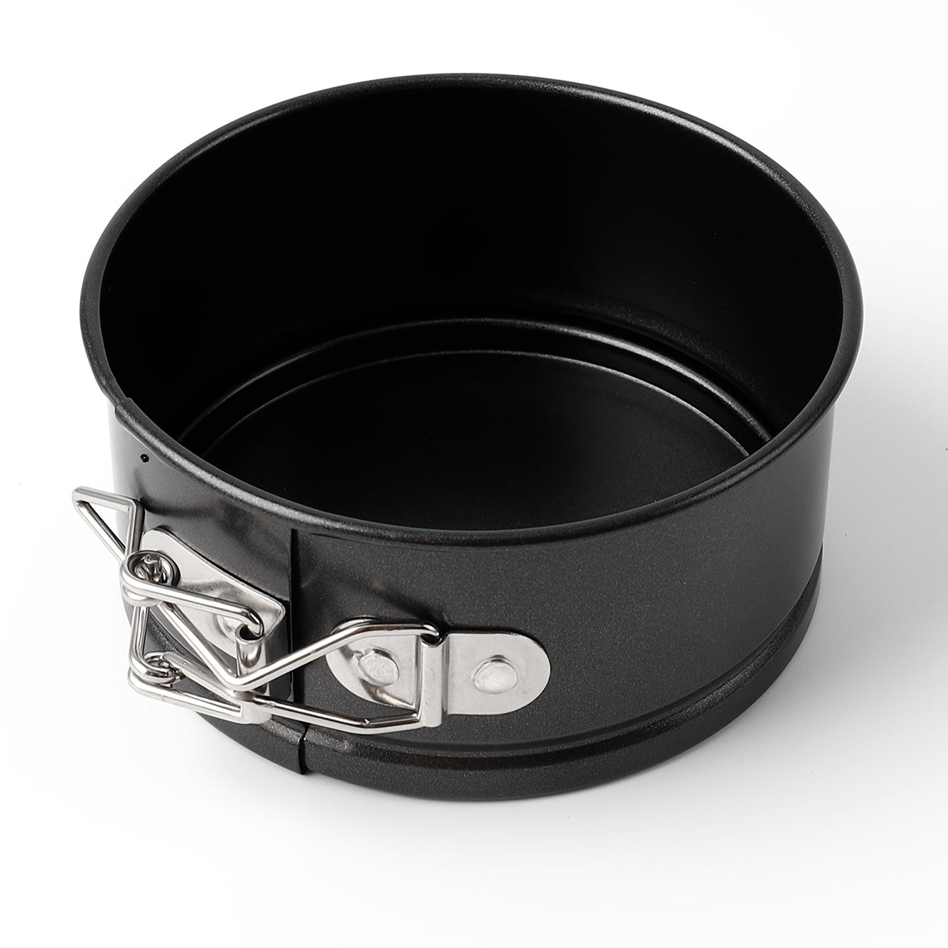 Круглая чугунная форма для выпечки с защелкивающимся дном, оснащенная кольцевой формой с легким освобождением и съемным кухонным аксессуаром для выпечки и приготовления пищи.