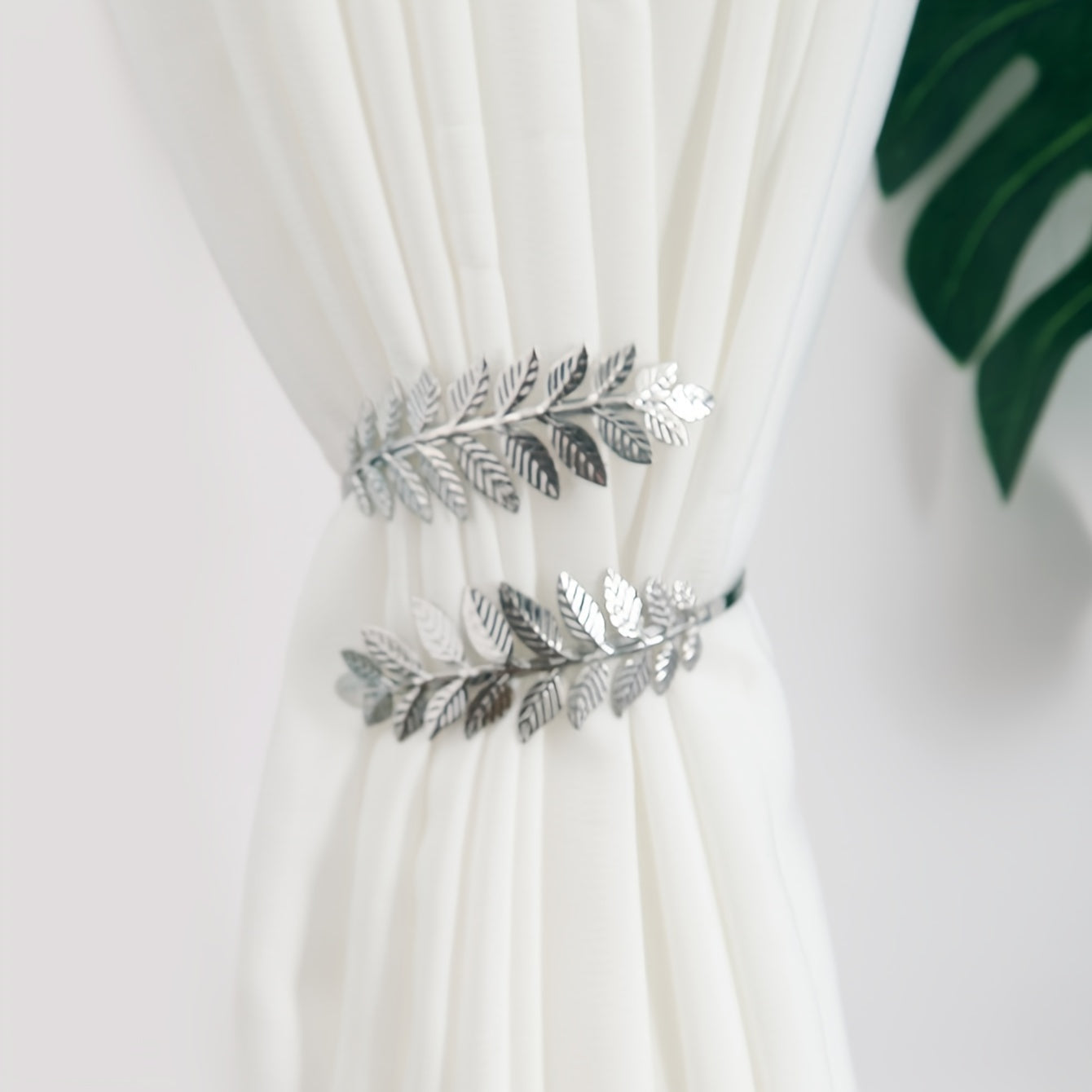 Decorative Curtain Tieback with Gold Accents and Leaf-Shaped Hooks