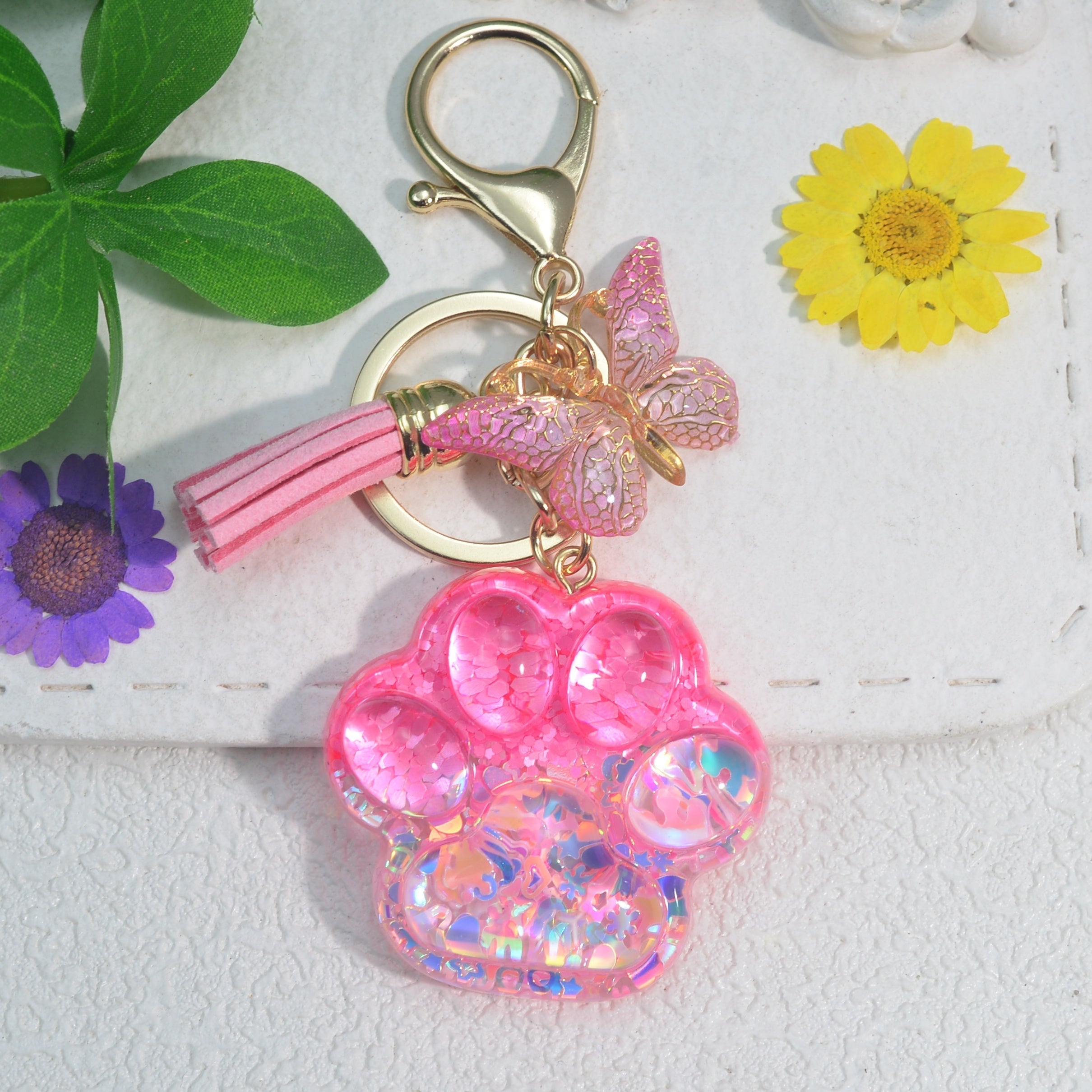 Llavero con borla de mariposa y pata de gato para amantes de los animales