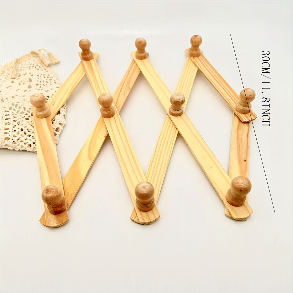 Gancho de pared retráctil de madera para bolsas, toallas, ropa y sombreros