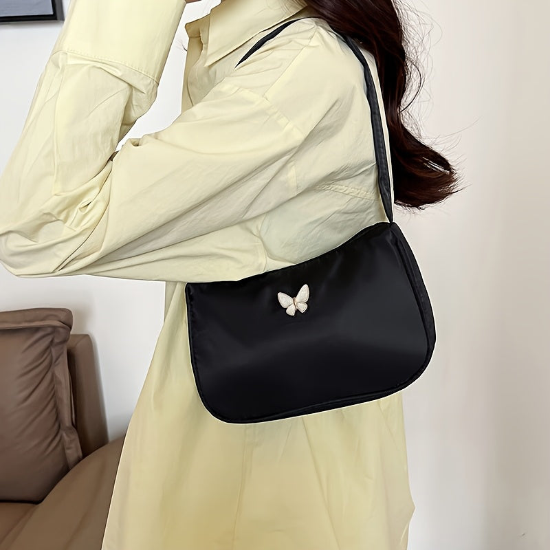 Ayollar uchun qora naylon crossbody sumka, tassel aksenti va zip yopilishi bilan