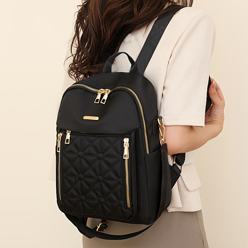 Women's Black Nylon Backpack with Tassel Detail Adjustable Shoulder Straps Multiple Compartments