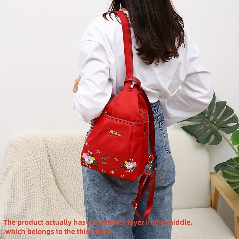 Nylon ayollar uchun ruksak, gullar bilan tikilgan, sozlanadigan kamarlar, qulaylik uchun qalin g'ovak qatlam, va zip yopilishi. Sayohat, ta'til, telefon, kalitlar va hamyon saqlash uchun ideal. Mavjud bo'lgan