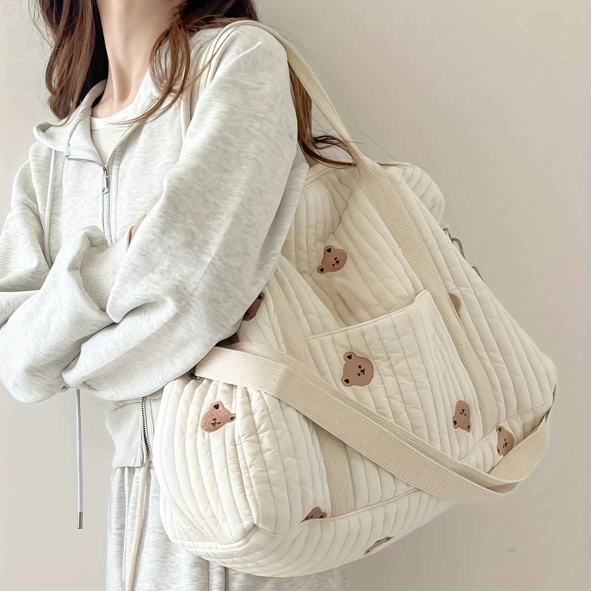 Quilted Diaper Bag for Parents with Embroidered Animal Print and Multiple Compartments