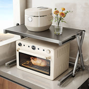 Moslashuvchan joyni tejash dizayni bilan zanglamaydigan po'latdan yasalgan mikroto'lqinli pech uchun javon. Mikroto'lqinli pech va oshxona asosiy buyumlarini saqlash uchun ideal. Bardoshli metall konstruktsiya. O'rnatishni talab qilmaydi.