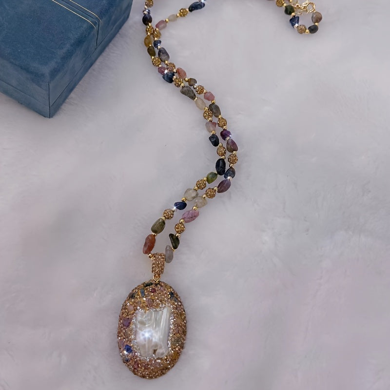 Zarif Barokko ilhomlangan zargarlik to'plami, yuqori sifatli Chex rhinestones bilan, zanjir, uzuk, sirg'a va sviter zanjirli pandentni o'z ichiga oladi.