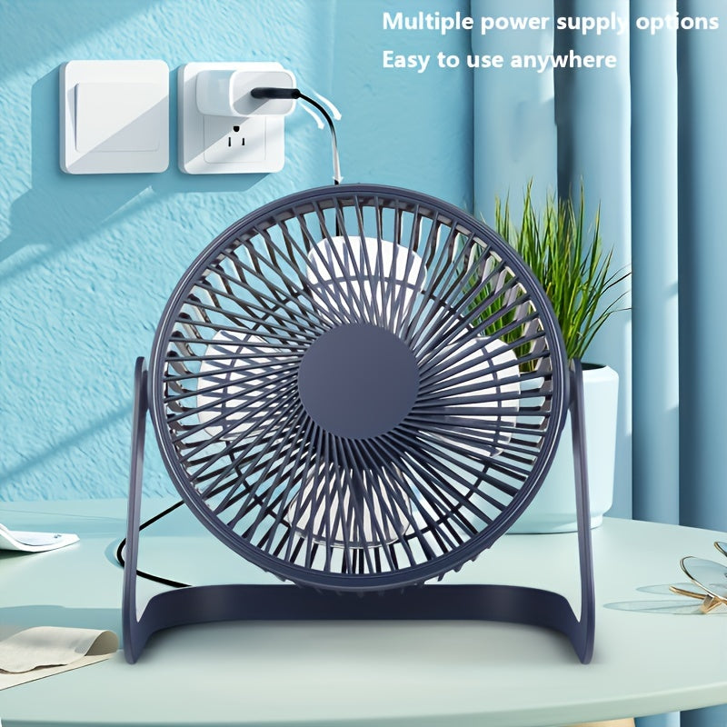 Портативный USB настольный вентилятор с регулируемой скоростью темно-синего цвета идеально подходит для использования в офисе, общежитии или дома. Предлагает несколько вариантов питания и может быть размещен гибко.