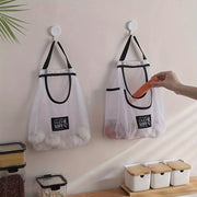 Удобно храните фрукты и овощи с помощью этой переносной, дышащей сетчатой сумки. Повесьте ее на стену кухни для легкого доступа к имбирю, чесноку и другим домашним вещам.