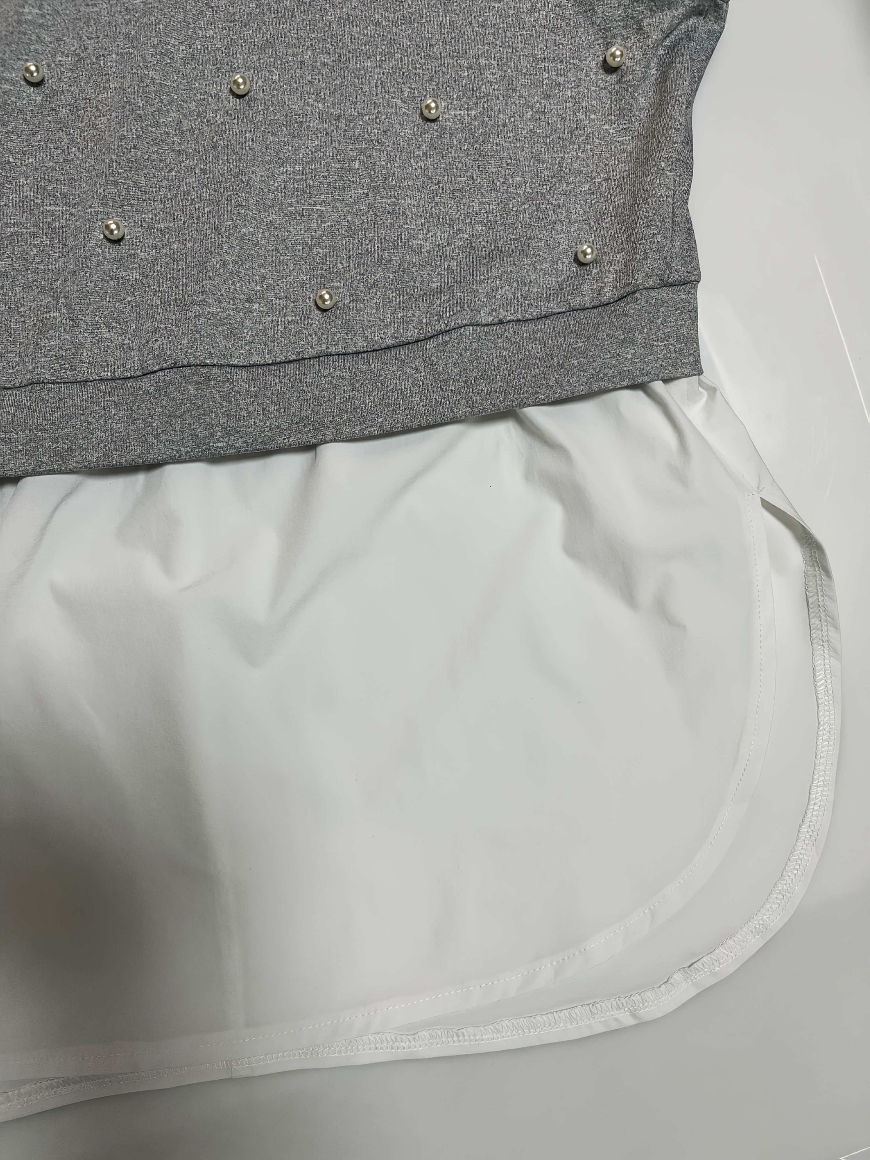 Plus o'lchamli ayollar uchun rang-blokli, marjon bilan bezatilgan qisqa ko'ylak