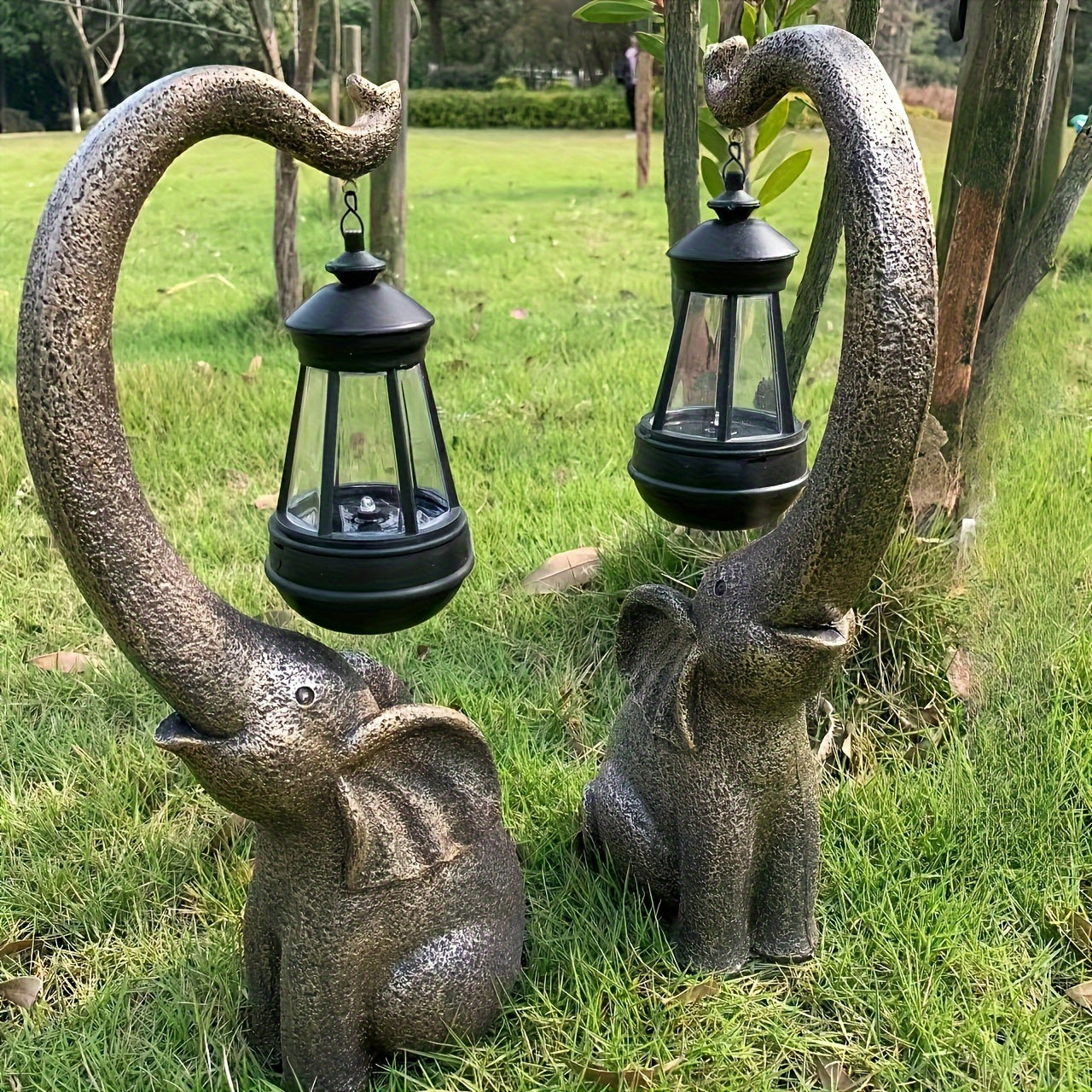 Solar-Powered Elephant Garden Lights Rustic Resin Outdoor Sculpture with Black Metal Lanterns