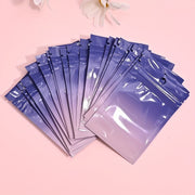 50 Pieces Laser Pearlescent Self-Sealing PE Bags for Jewelry Wedding Party Reusable Dustproof 10x7cm