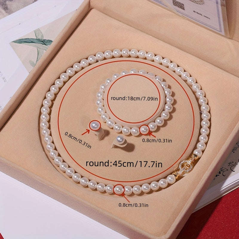 Go'zal, zamonaviy, shirin suv marvaridlaridan iborat to'plam, uchta qismdan iborat, hech qanday qoplamasiz - har kuni kiyish, sovg'a berish, Mardi Gras bayramlari va barcha fasllar uchun mos. To'ylar, yubileylarda, Sevgi kuni va Ona kuni uchun mukammal.