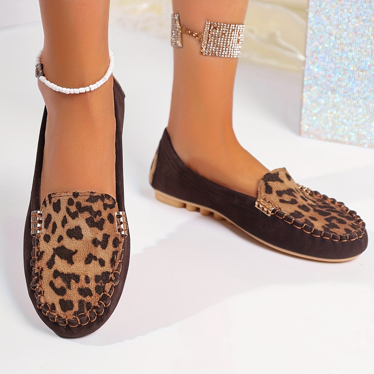 Women's Leopard Print Slip-On Flats with Rubber Sole and Metal Accents