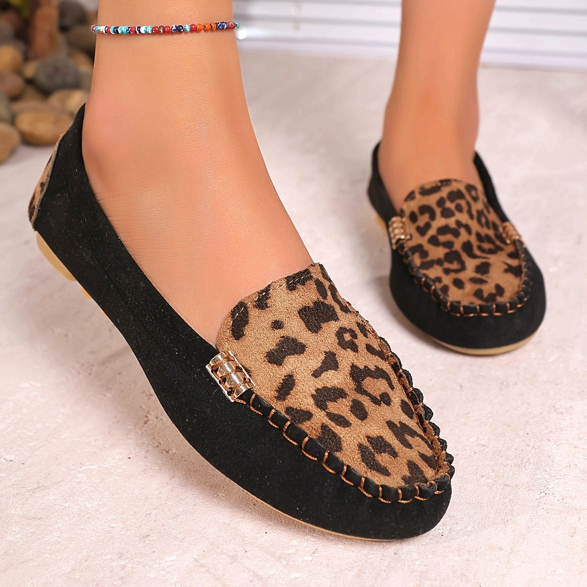 Women's Leopard Print Slip-On Flats with Rubber Sole and Metal Accents