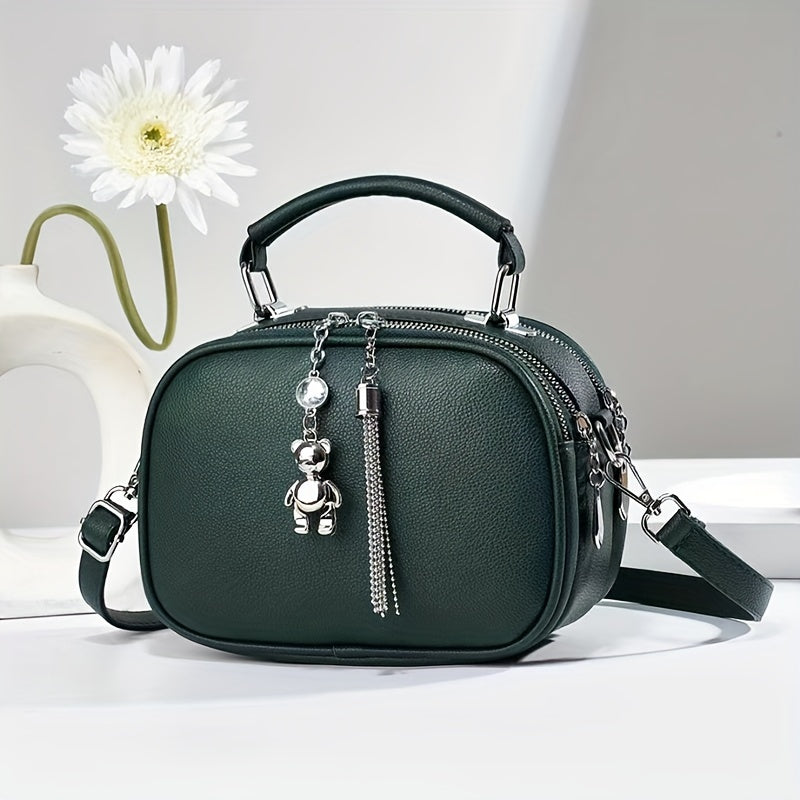 Black Mini Crossbody Bag with Bear Tassel and Multiple Compartments