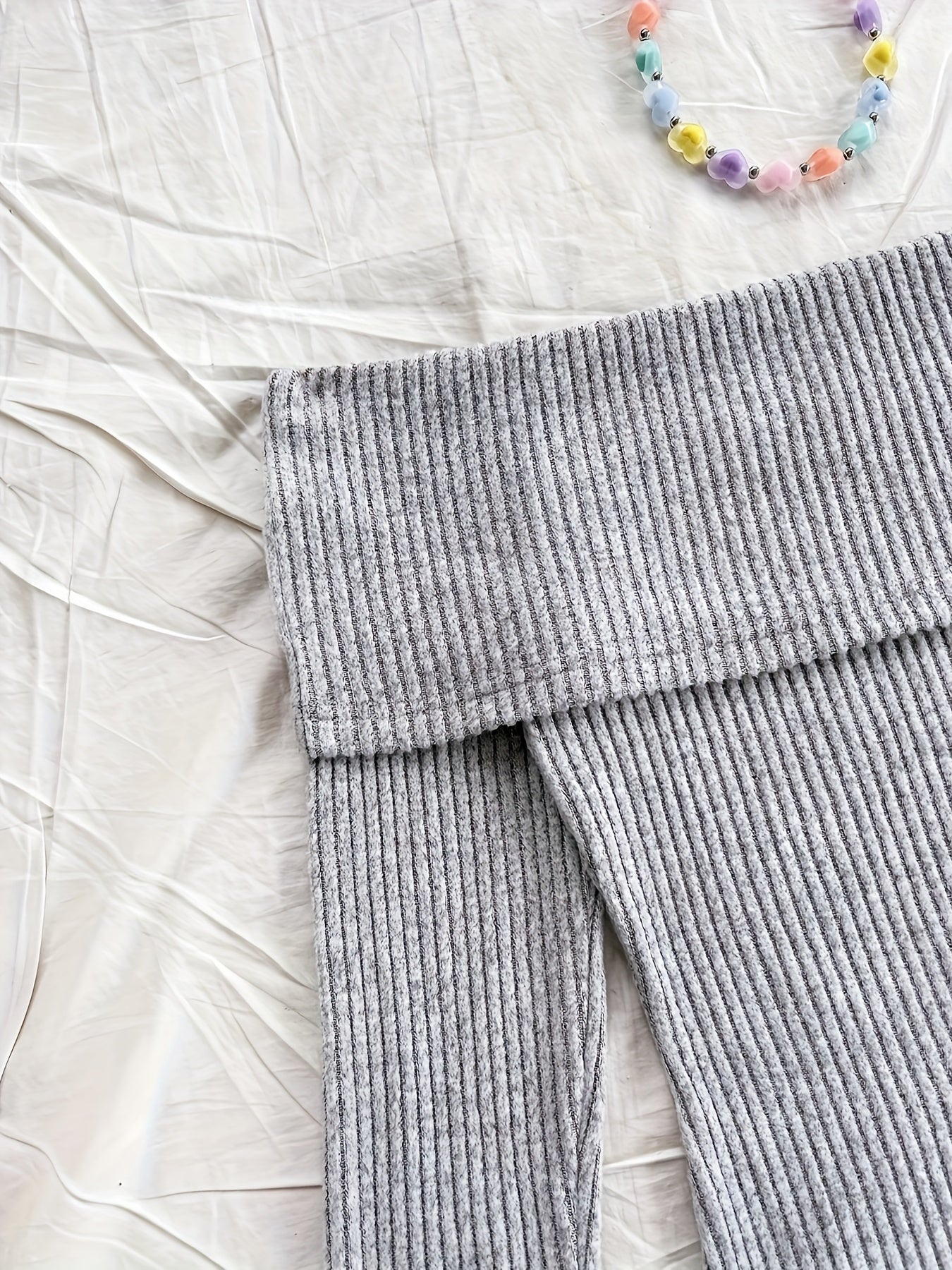 Комбинезон в стиле Y2K с открытыми плечами и шнуровкой с бантом. Высокая эластичность и машинная стирка.