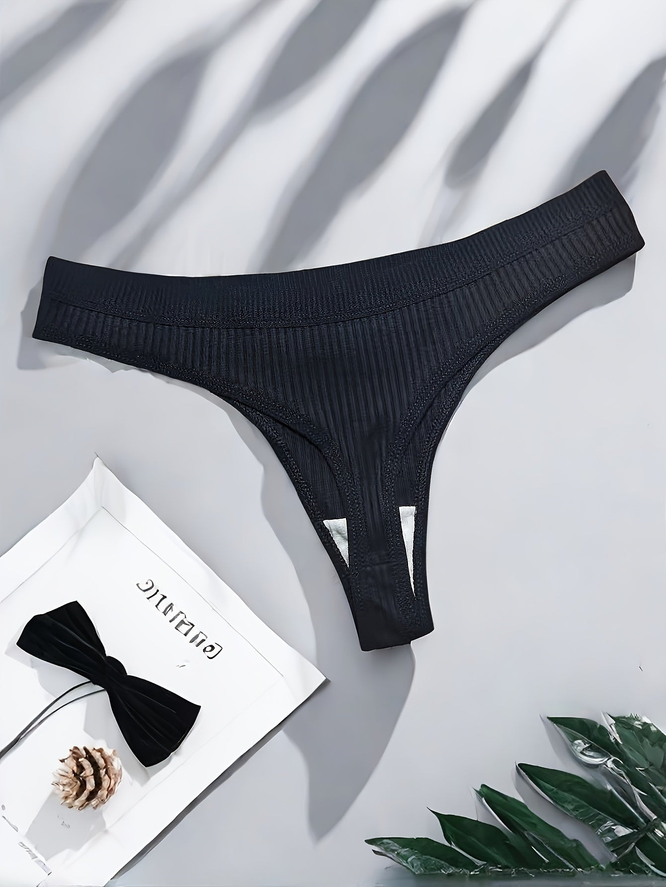 Women's Black Semi-Sheer Ribbed Thong Panties with Side Stripe and Low Rise