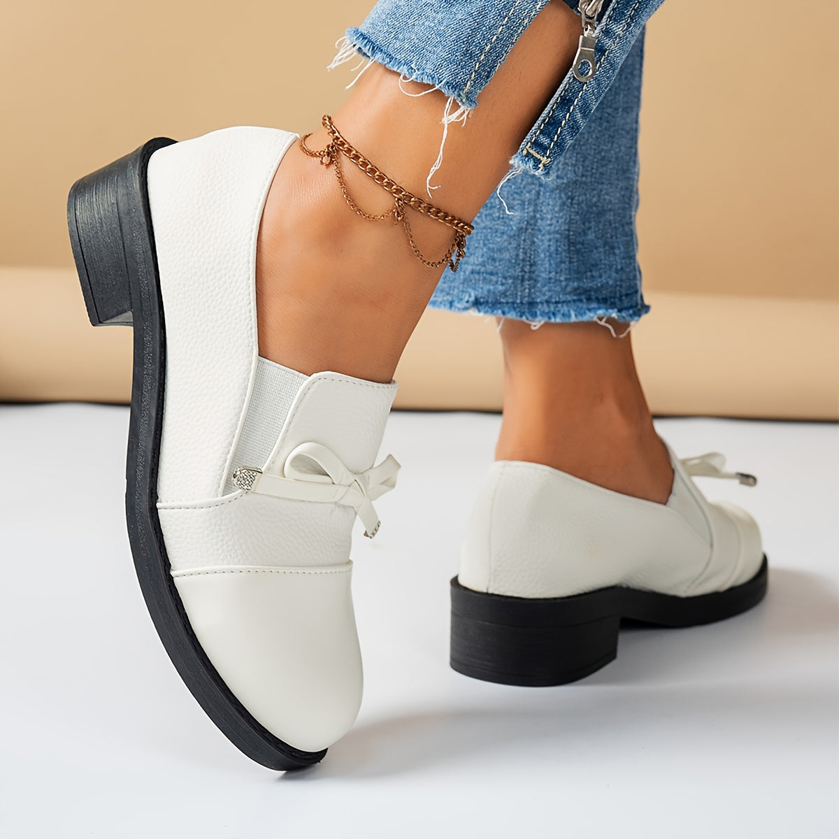 Women's Faux Leather Loafers with Rubber Sole and Bowknot Detail