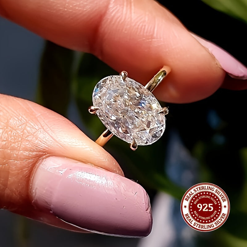 Oddiy va nafis 14K oltin qoplamali S925 kumush uzuk, 1CT, 2CT yoki 3CT oval kesilgan sintetik kubik zirkoni bilan. Kundalik kiyish uchun yoki o'ylangan sovg'a sifatida mukammal.