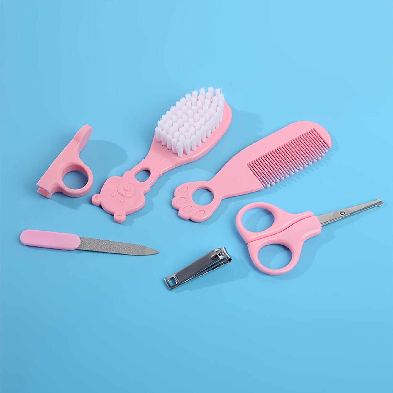 Juego de 6 artículos de cuidado para bebés en una caja con peine, cortaúñas, tijeras, lima de uñas y cepillo
