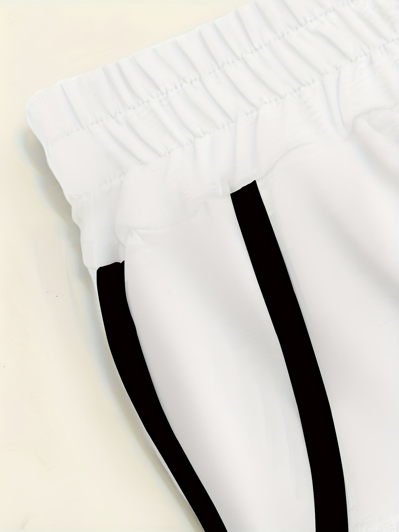 Capris casual de talla grande para mujer con bolsillos de contraste, cintura elástica, bloque de colores rojo y negro