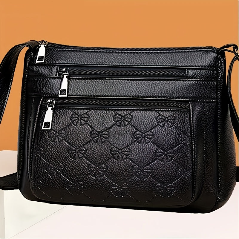 Black Nylon Crossbody Bag for Women with Adjustable Strap and Embossed Bow Pattern