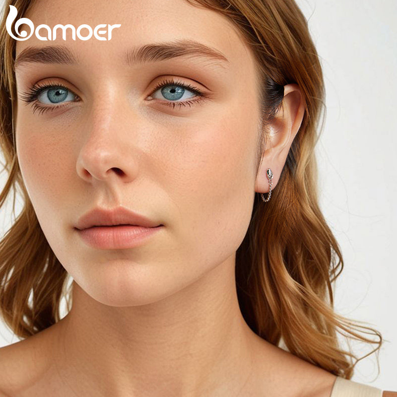 Vintage punk uslubi 1 juft GAMOER zamonaviy ilon tassel halqa bilaguzuklari ayollar uchun yashil qimmatbaho tosh ko'zlari bilan. Gippoallergen 925 sterling kumushdan tayyorlangan, musiqa festivallari va partiyalar uchun mukammal.