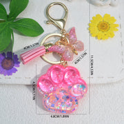 Llavero con borla de mariposa y pata de gato para amantes de los animales