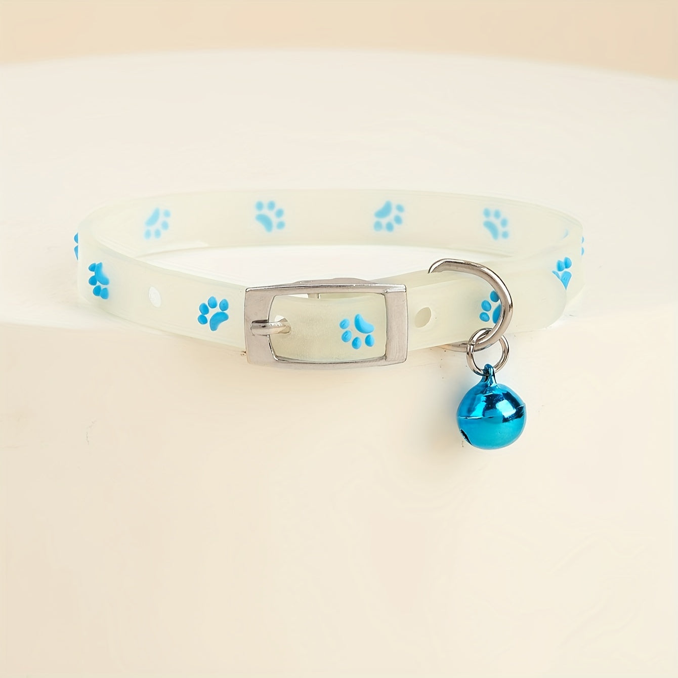 Adjustable Glow-in-the-Dark Cat Collar with Colorful Paw Print and Rubber Material