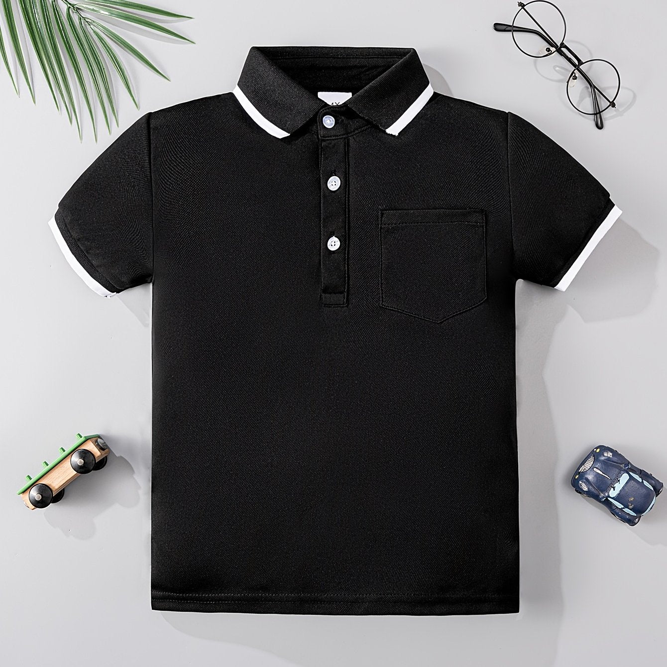 Camisa de punto para niños en verano, en blanco y negro, de manga corta, con bolsillo, top casual