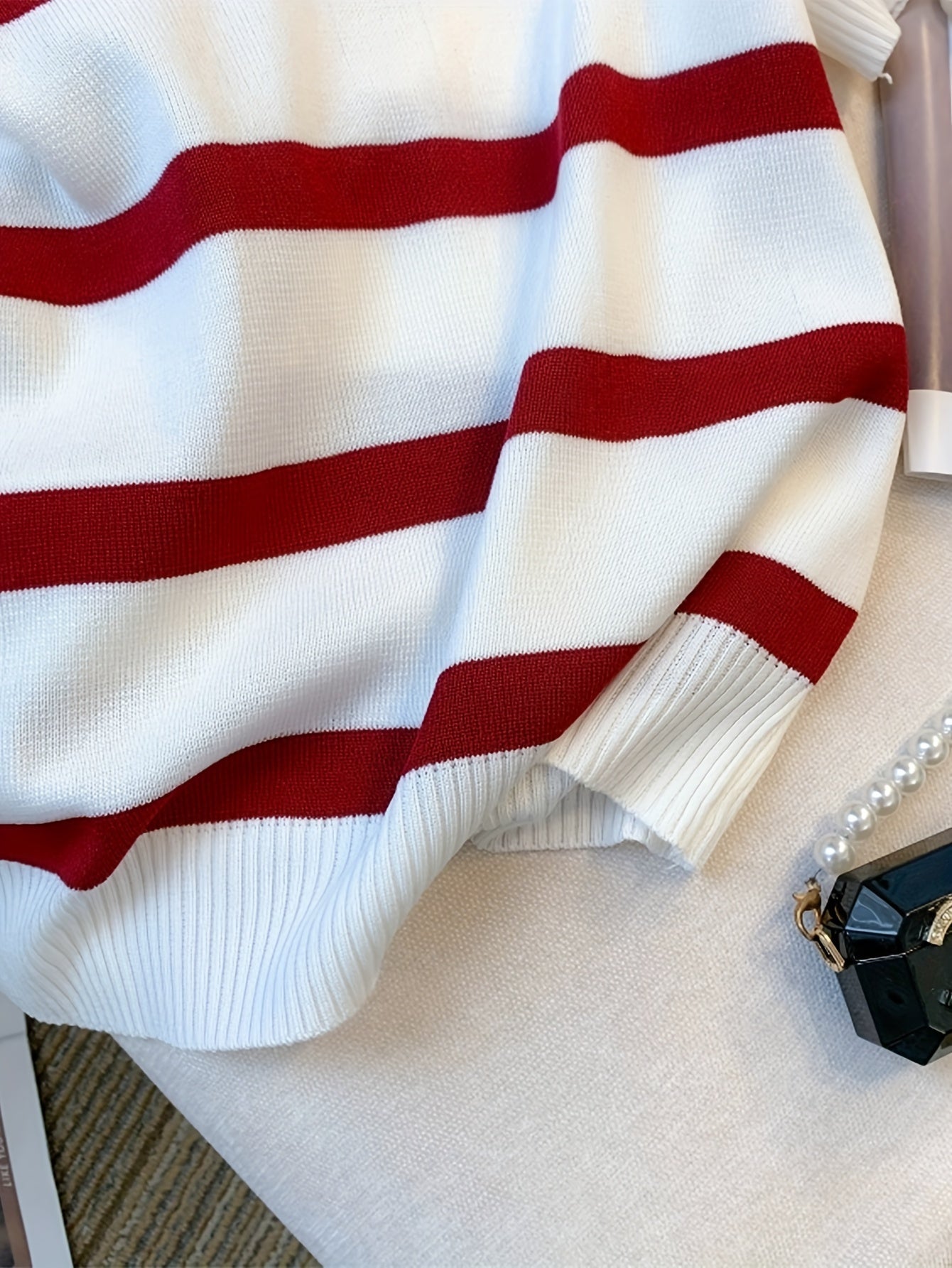 Top de punto europeo y americano con rayas en bloques de color y cuello vuelto