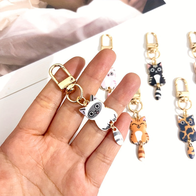 Set of 7 Zinc Alloy Cat Tail Keychains with Movable Tails for Bags and Zippers