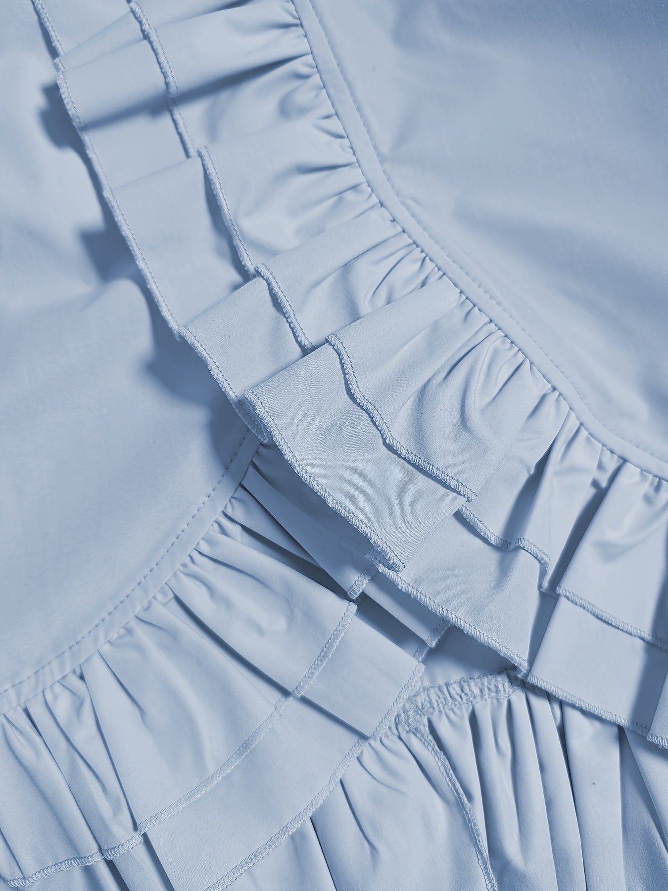 Blusa de color sólido para mujer con volante en el cuello en poliéster y spandex para todas las estaciones