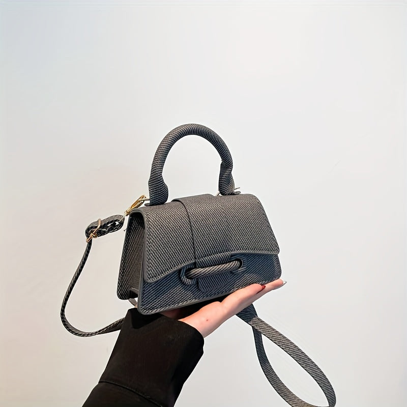 Kahaki, kulrang, pushti, yashil va och jigarrang ranglarda uslubiy mini crossbody sumka, sozlanadigan kamar, magnit yopish va astar bilan. Mustahkam rang, naqsh yoki bosma yo'q, chetlarini tugatish bilan.