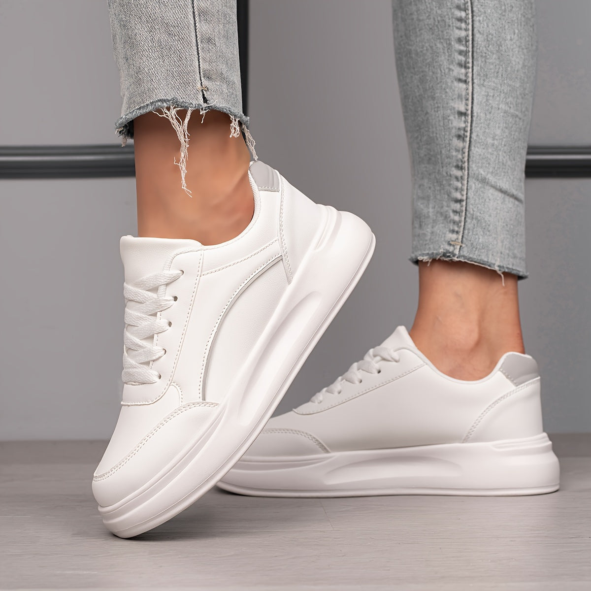 Women's White Low Top Skate Shoes with Round Toe and Lace-Up Closure