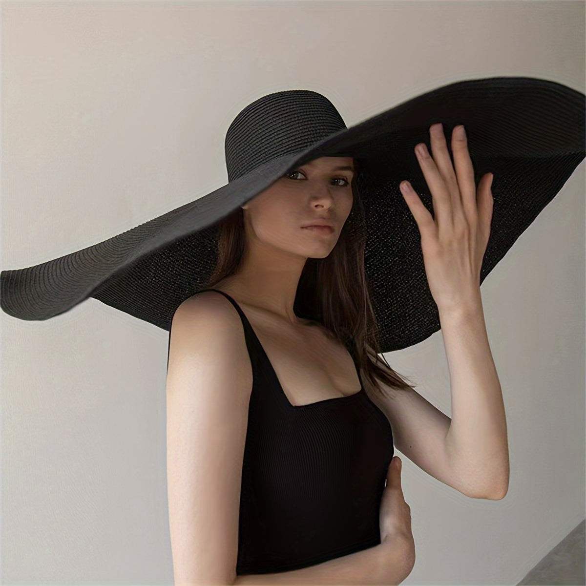 Foldable Black Straw Sun Hat with Wide Brim UV Protection for Beach Travel