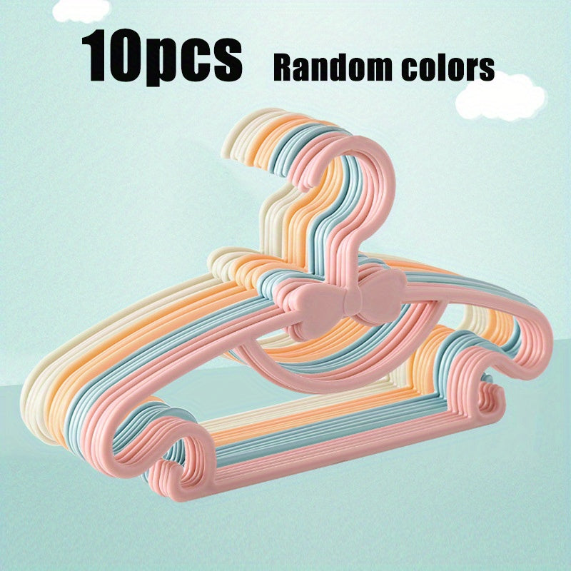 Juego de 10 perchas para ropa de niños, material PP, con diseño de lazo, para almacenamiento en armario de recién nacidos y niños